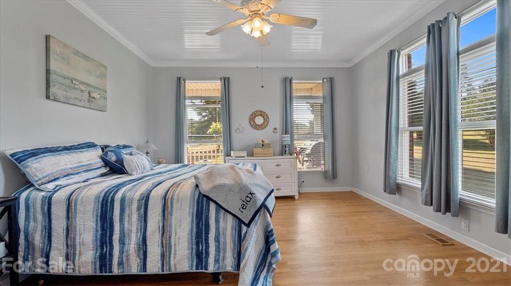 3928 Biggers Road Clover, SC 29710 - Photo 15 of 45 a bed room with a bed mirror and a window