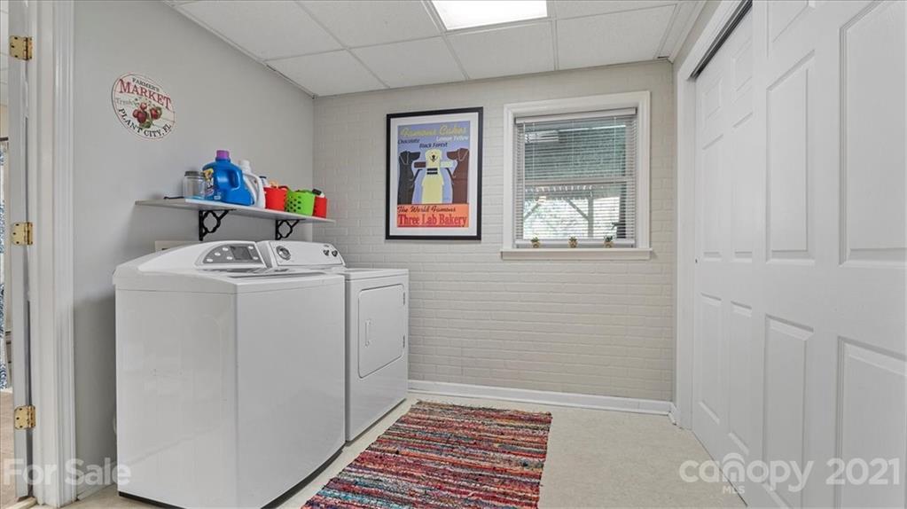 3928 Biggers Road Clover, SC 29710 - Photo 29 of 45 a utility room with a window dryer and washer