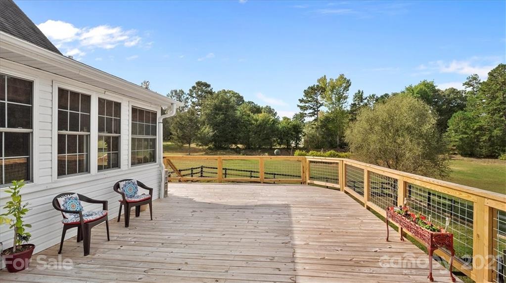 3928 Biggers Road Clover, SC 29710 - Photo 30 of 45 a view of a chairs and table on the wooden floor