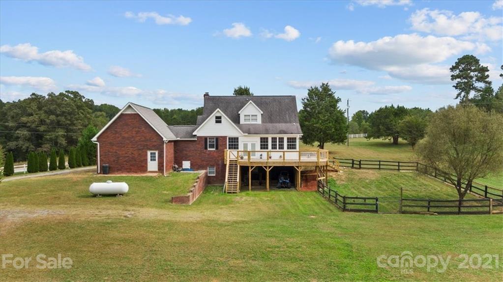 3928 Biggers Road Clover, SC 29710 - Photo 34 of 45 a view of a house with a big yard