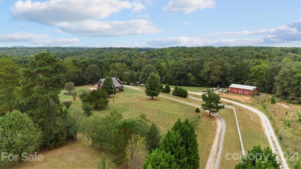 3928 Biggers Road Clover, SC 29710 - Photo 40 of 45 a view of a swimming pool with a yard and mountain view