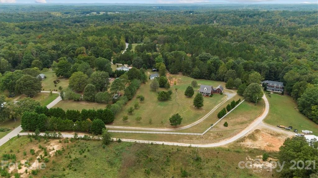 3928 Biggers Road Clover, SC 29710 - Photo 41 of 45 a view of a swimming pool with a yard