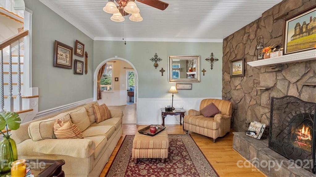 3928 Biggers Road Clover, SC 29710 - Photo 6 of 45 a living room with patio couch and a fireplace