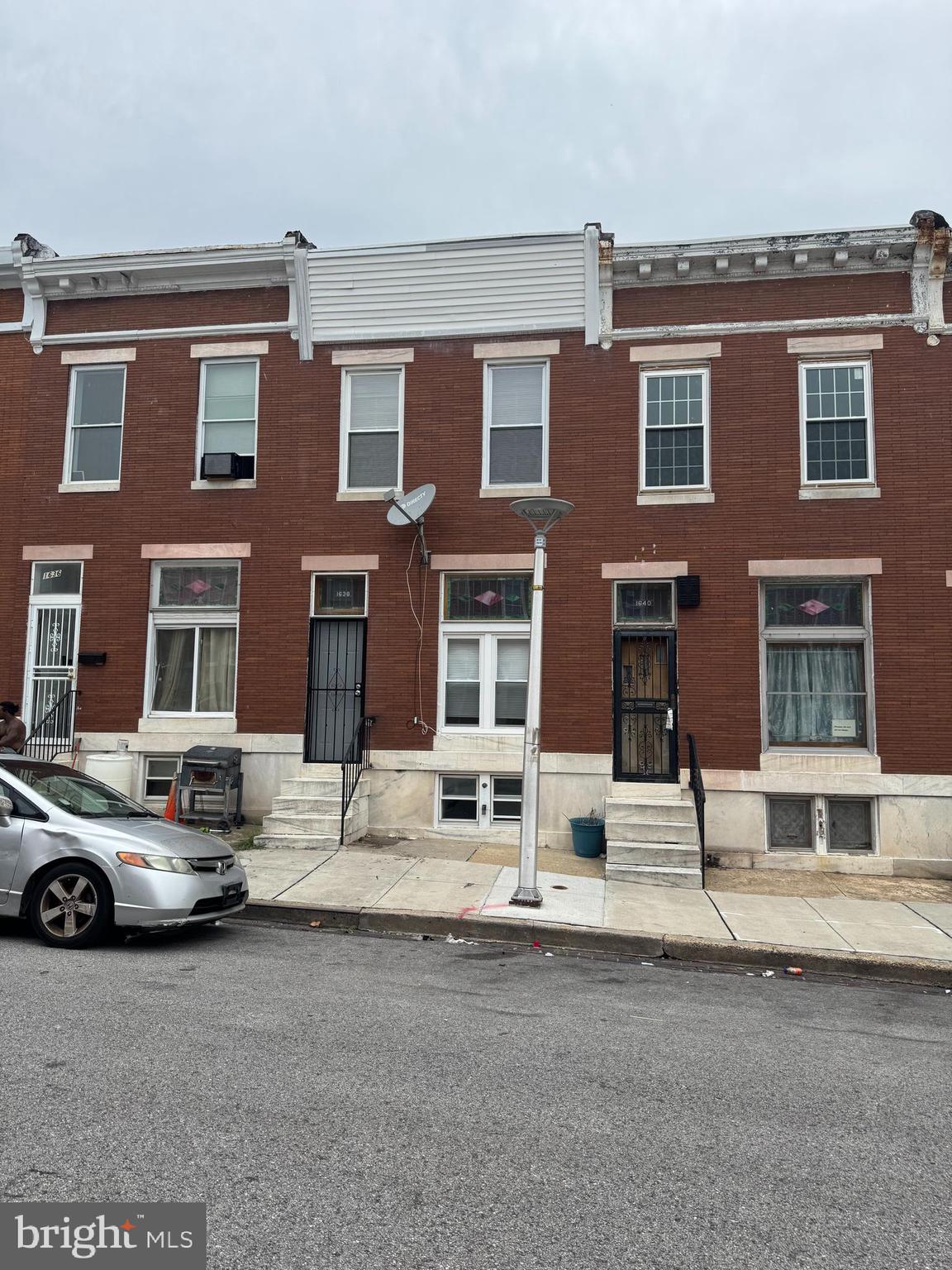 1638 Darley Avenue Baltimore, MD 21213 - Photo 15 of 15 a building that has a lots of windows in it