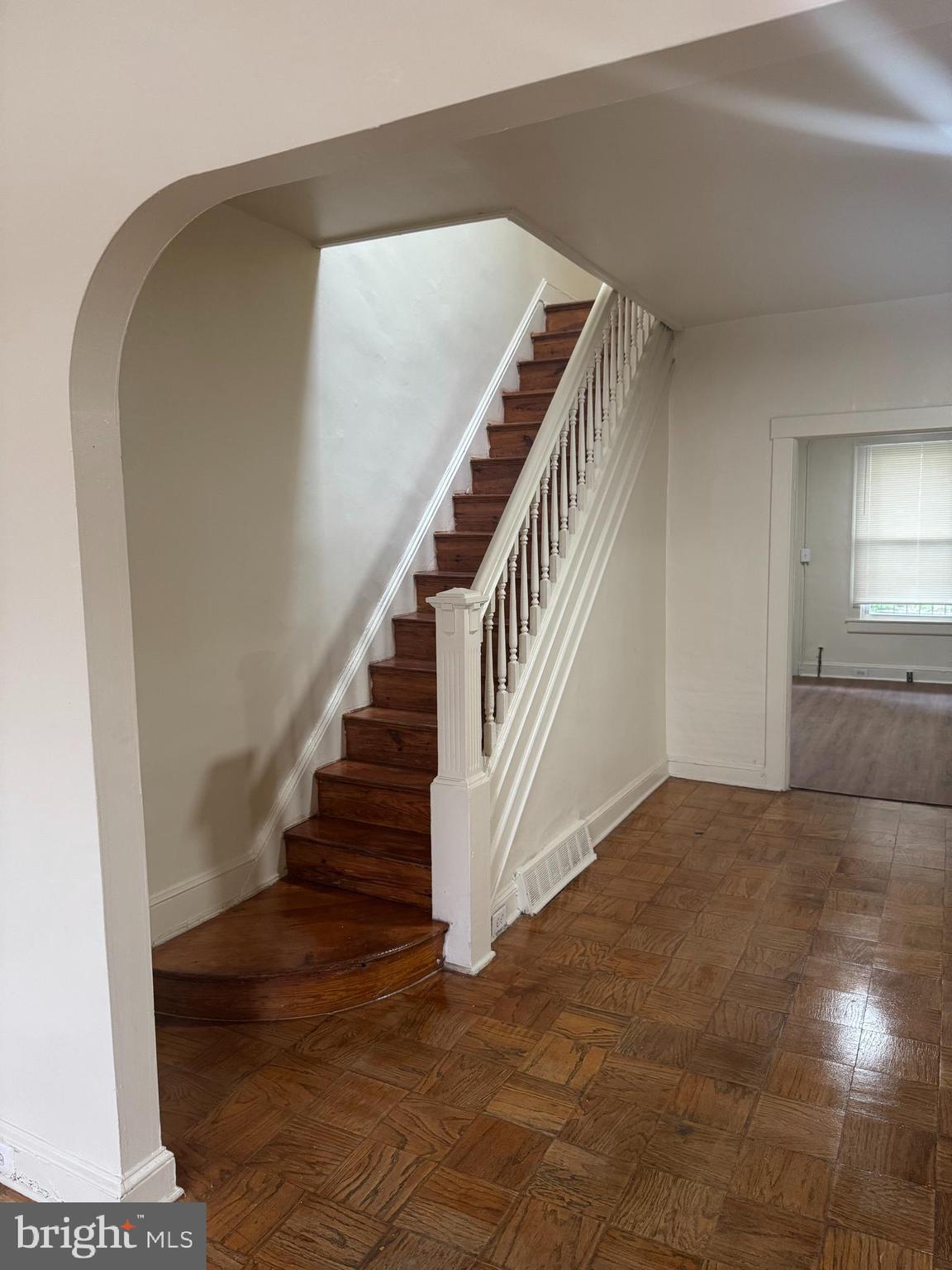 1638 Darley Avenue Baltimore, MD 21213 - Photo 4 of 15 a view of entryway and hall with wooden floor