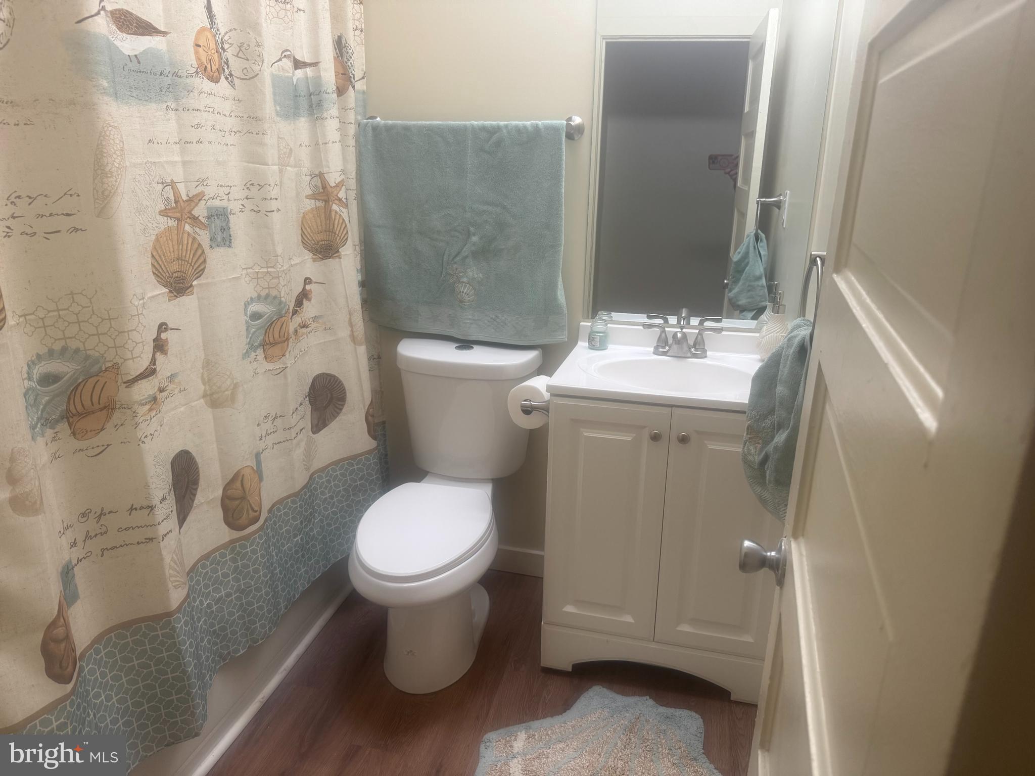 1638 Darley Avenue Baltimore, MD 21213 - Photo 5 of 15 a bathroom with a sink toilet and shower