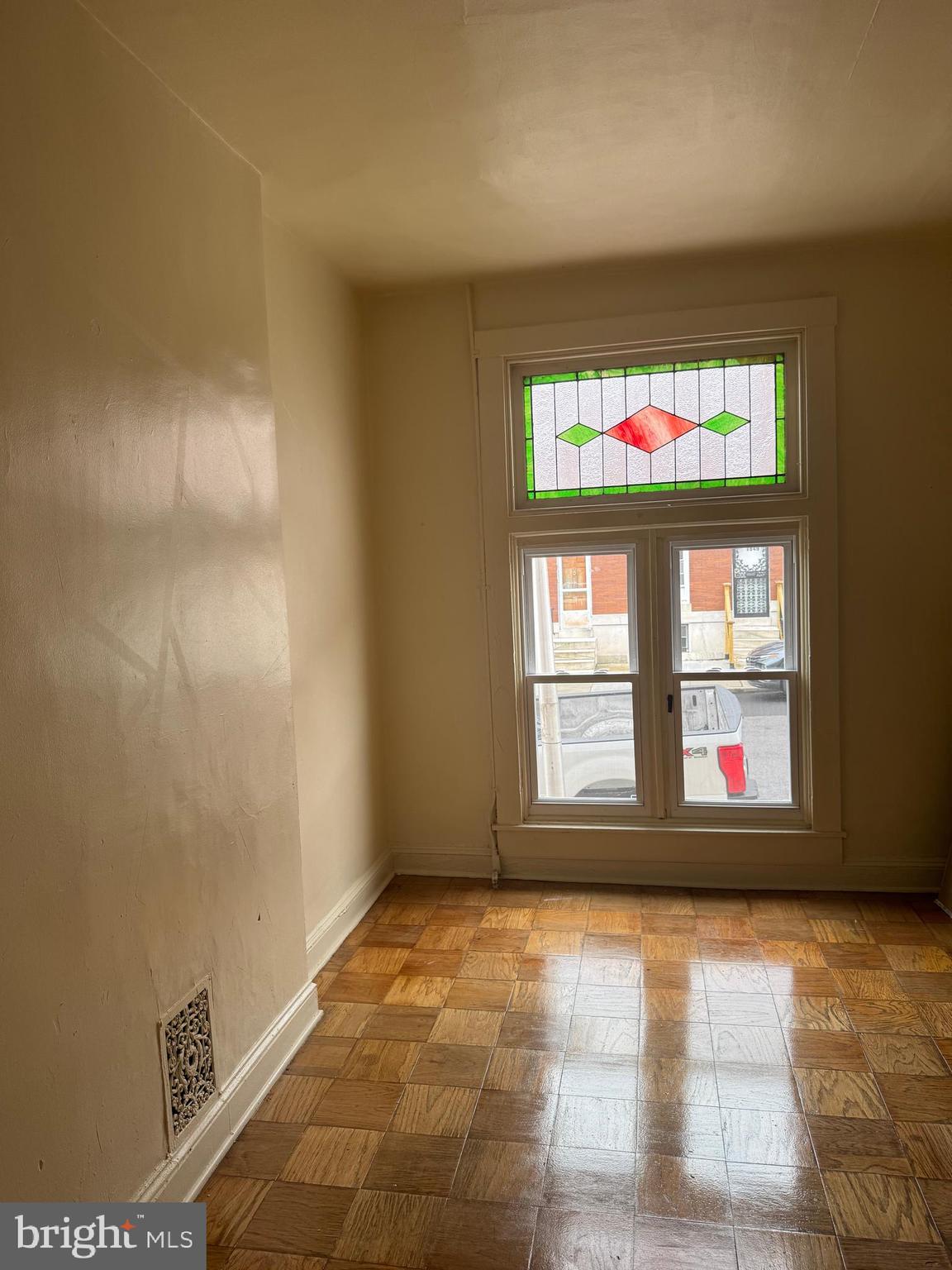 1638 Darley Avenue Baltimore, MD 21213 - Photo 6 of 15 a view of an empty room and window