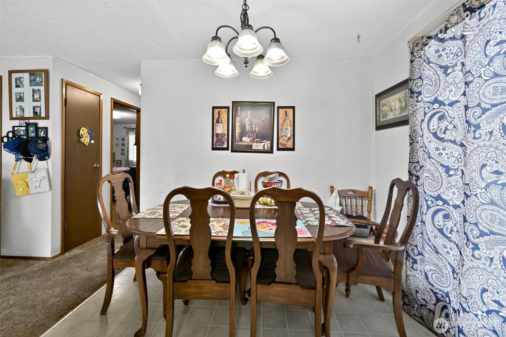 410 10th Street Lynden, WA 98264 - Photo 18 of 28 a view of a dining room with furniture and chandelier