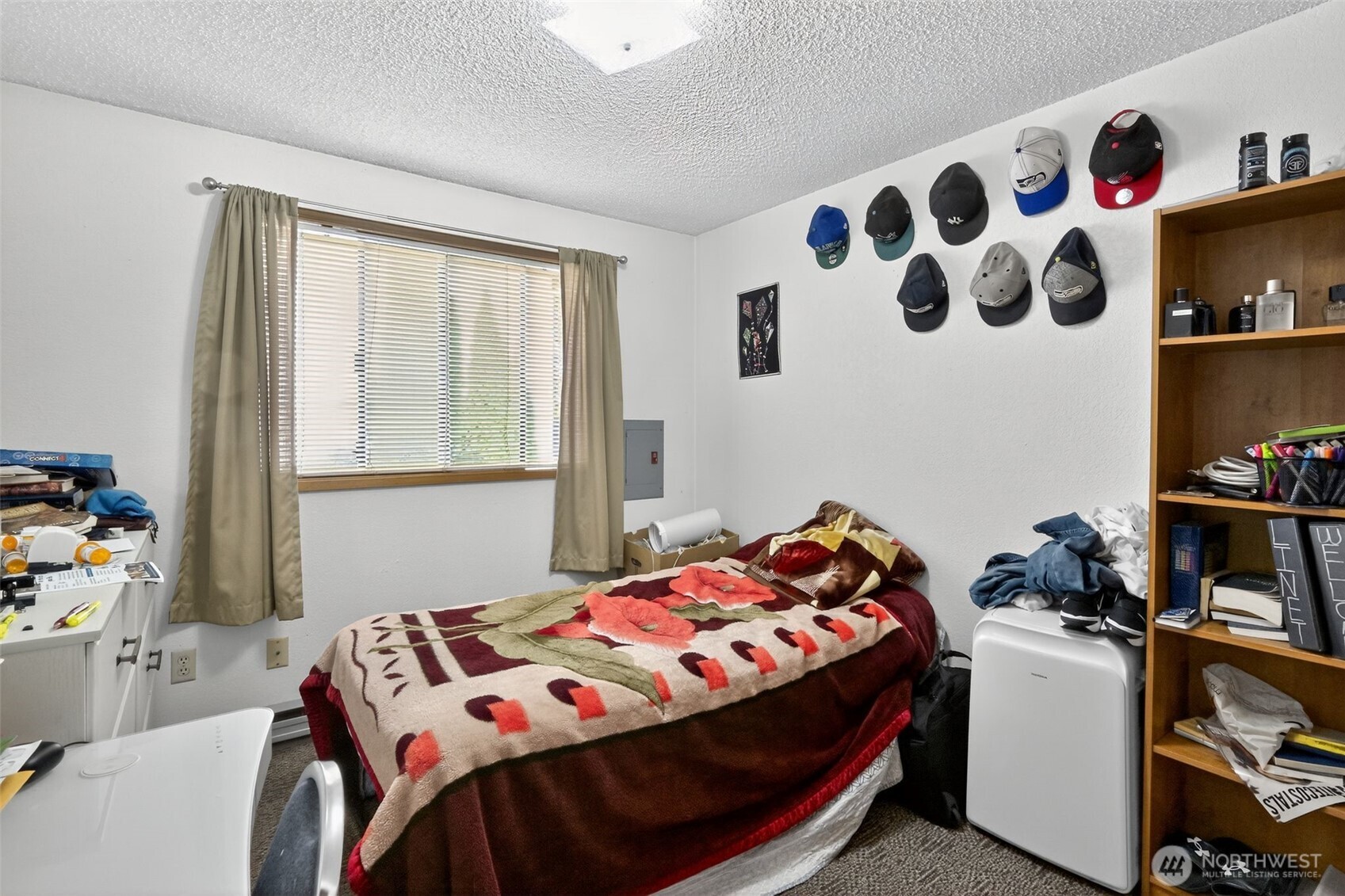 410 10th Street Lynden, WA 98264 - Photo 19 of 28 a bedroom with a bed and a window