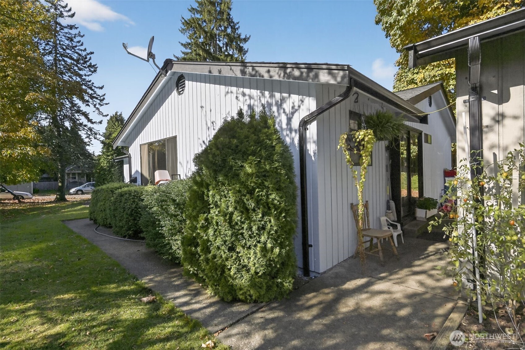 410 10th Street Lynden, WA 98264 - Photo 23 of 28 a view of a house with a yard