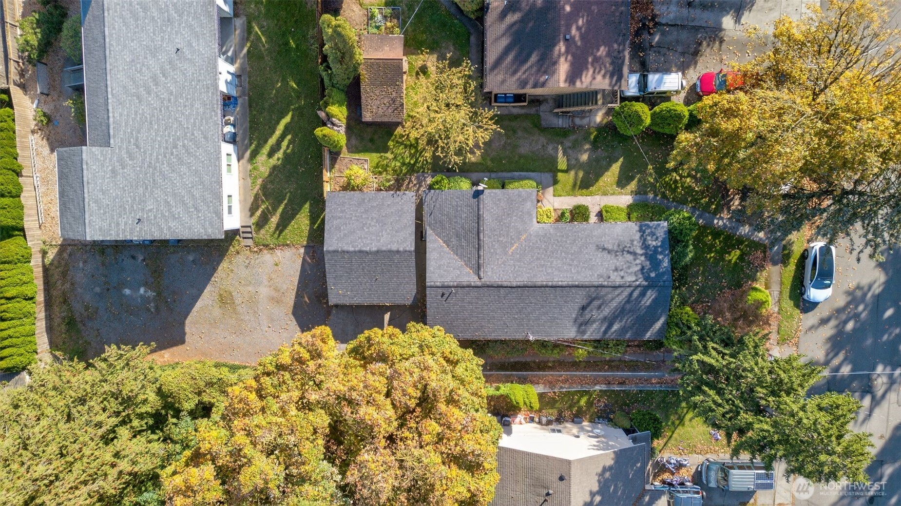 410 10th Street Lynden, WA 98264 - Photo 25 of 28 a potted plant sitting in front of a house