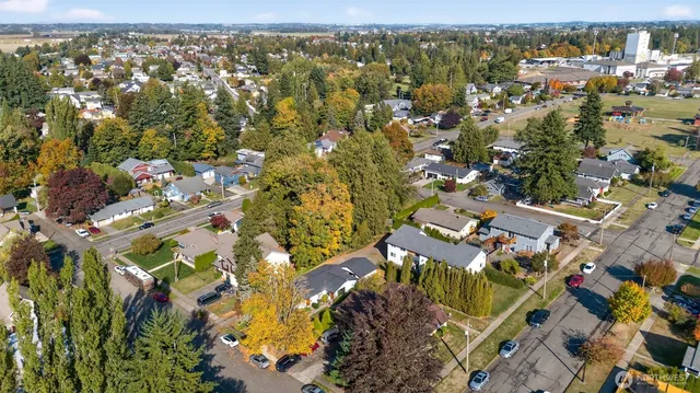 an aerial view of residential building with parking space
