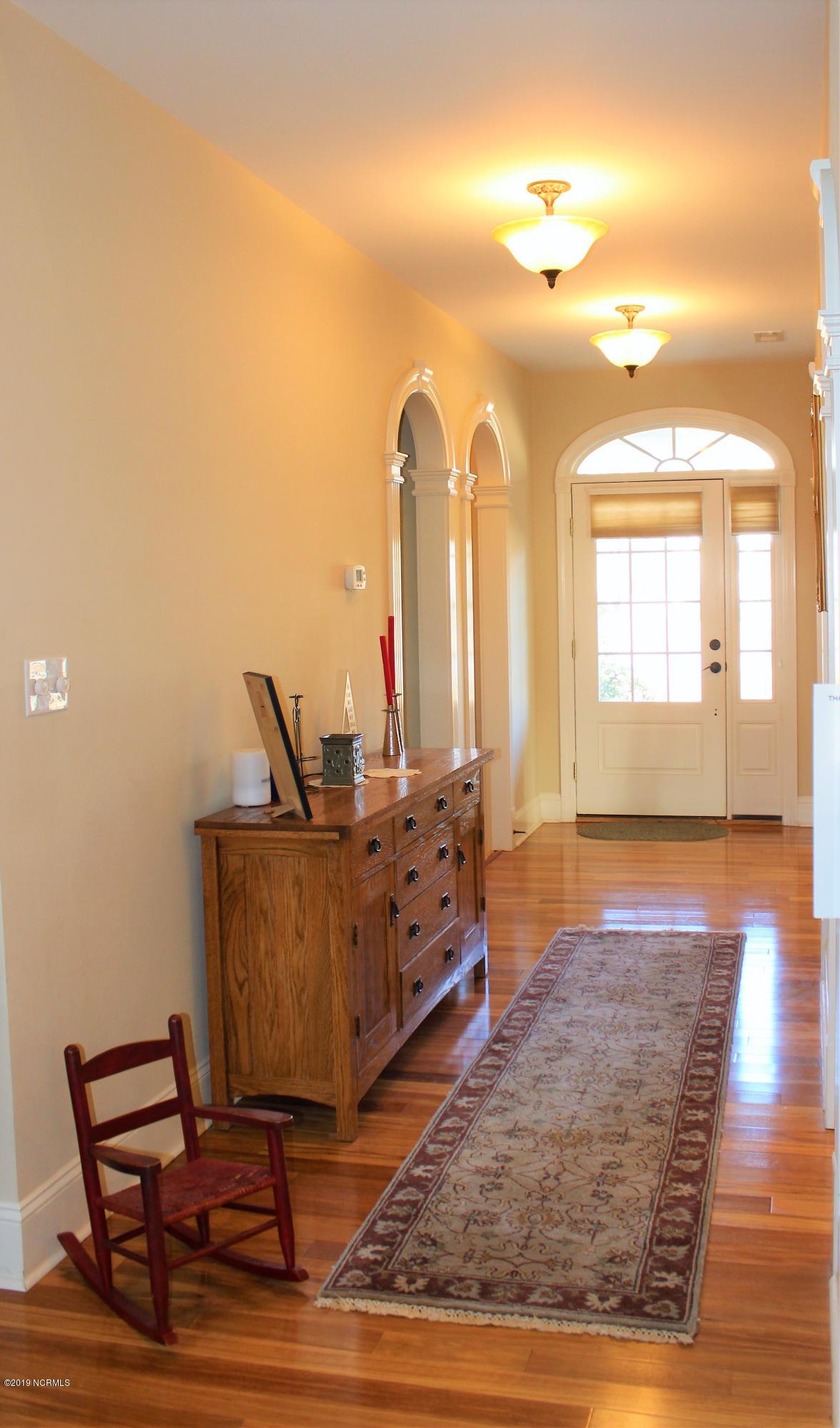 126 East Holly Ridge Road New Bern, NC 28562 - Photo 3 of 23 FOYER HALL TOWARDS FRONT DOOR