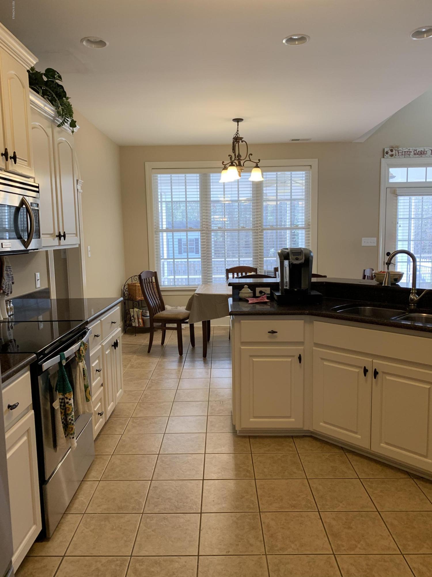 126 East Holly Ridge Road New Bern, NC 28562 - Photo 8 of 23 KITCHEN TO BREAKFAST ROOM
