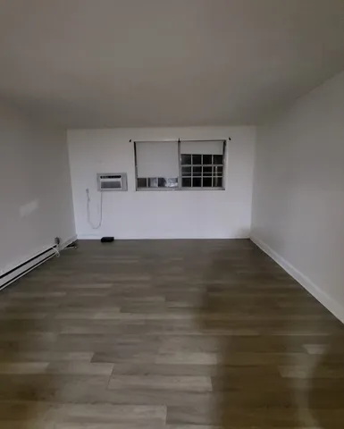 a view of a room and empty room