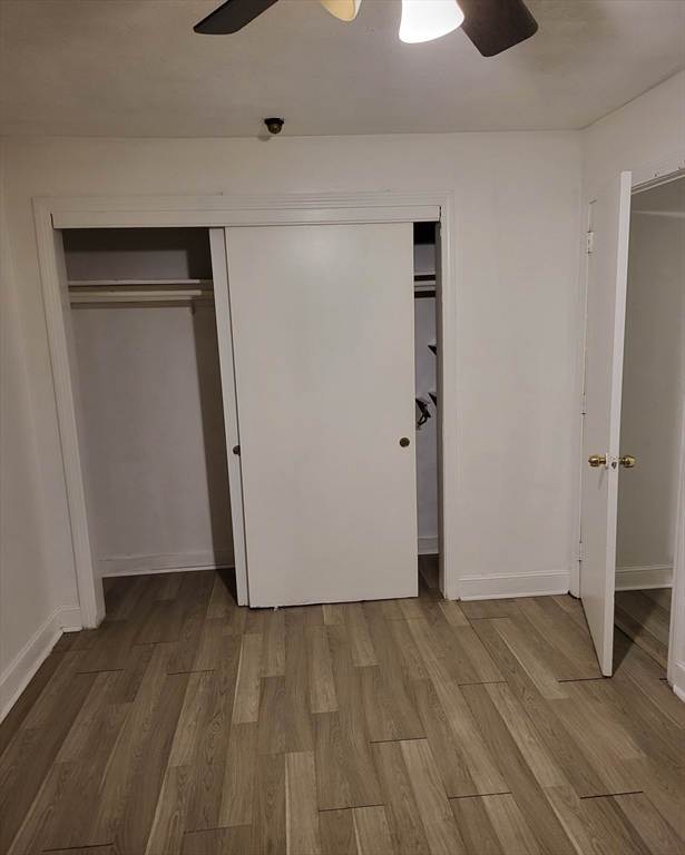 1 Walker Road, Unit 1 North Andover, MA 01845 - Photo 5 of 8 a view of empty room with wooden floor