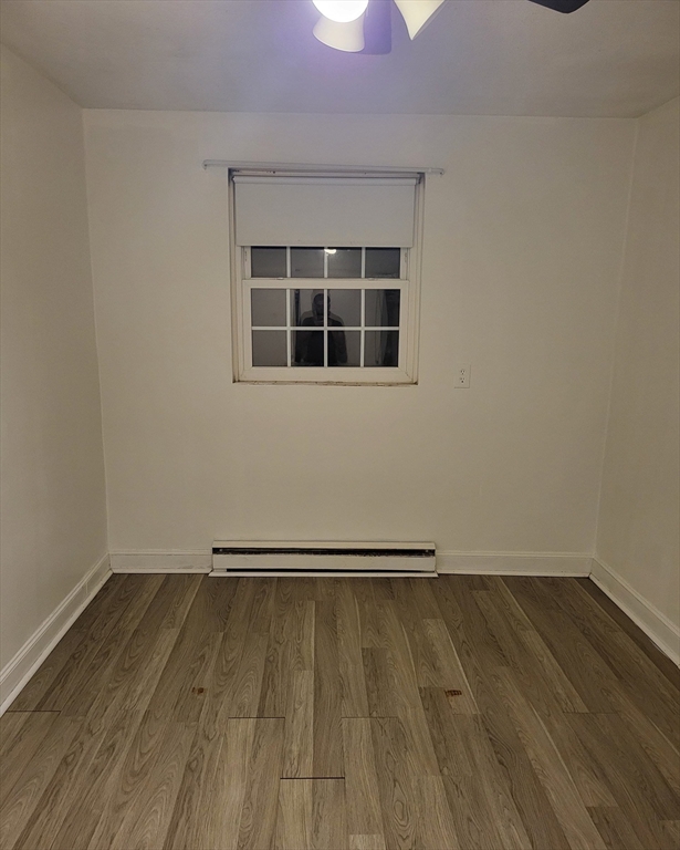 1 Walker Road, Unit 1 North Andover, MA 01845 - Photo 8 of 8 a view of a room with wooden floor and a window