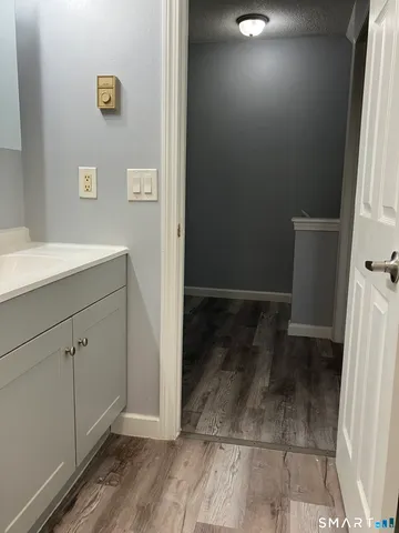 wooden floor and window in an empty room