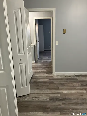 a kitchen with granite countertop cabinets stainless steel appliances and sink