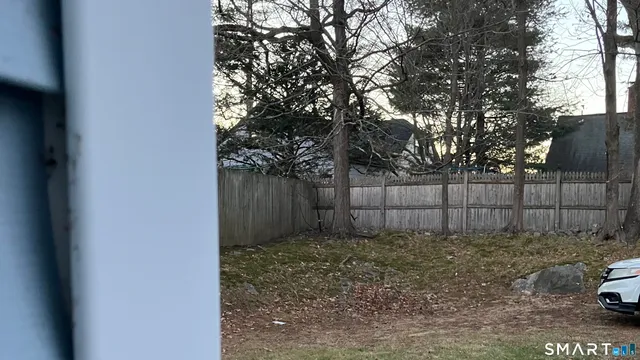 a view of a door and a window