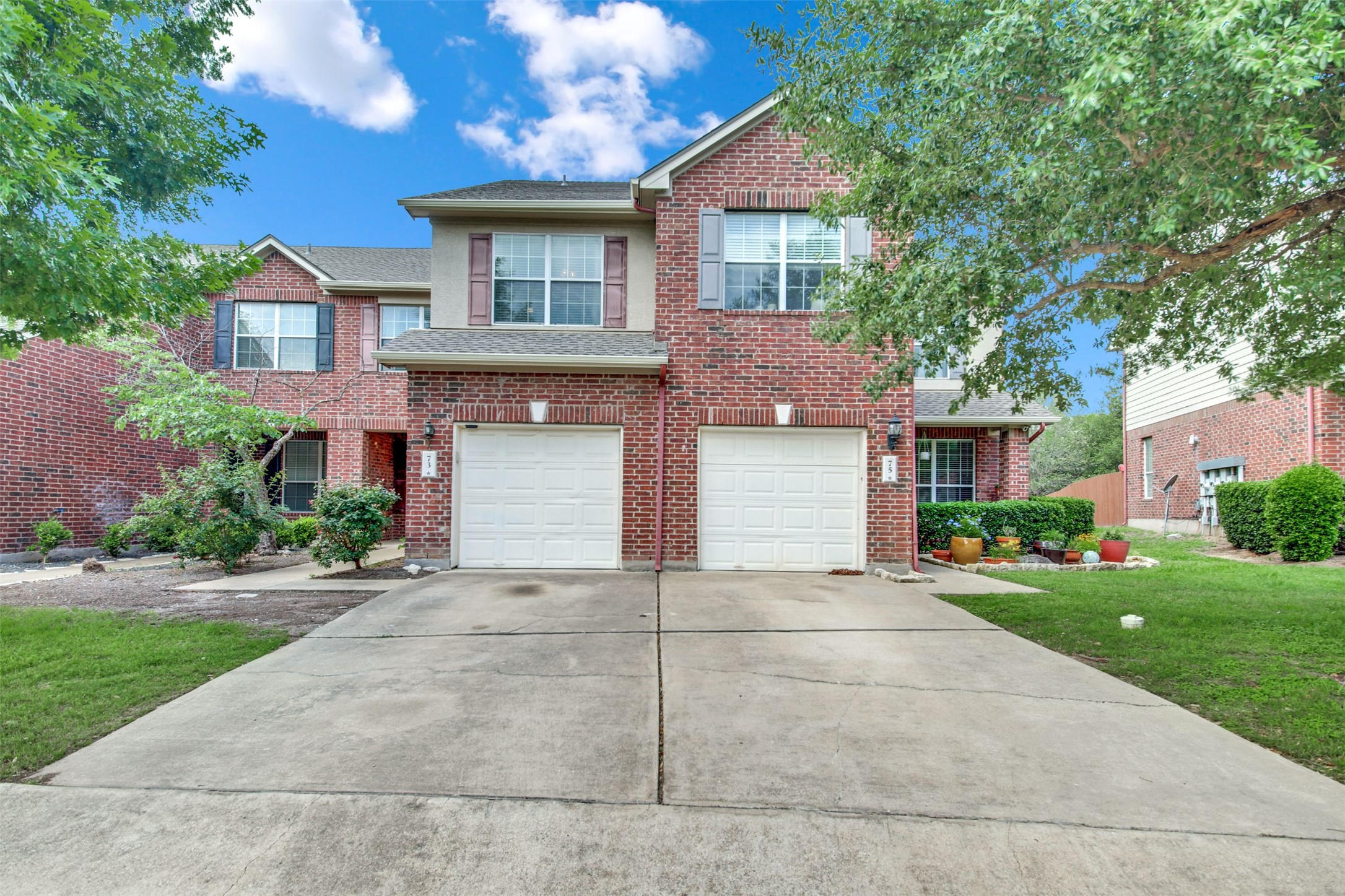 73 Verde Ranch Loop Leander, TX 78641 - Photo 4 of 29 front view of a house with a yard