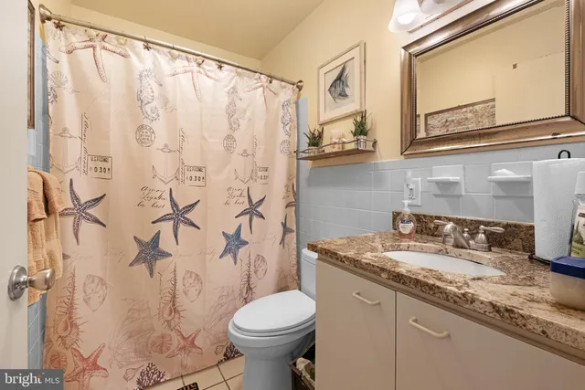 a bedroom with bed and a window