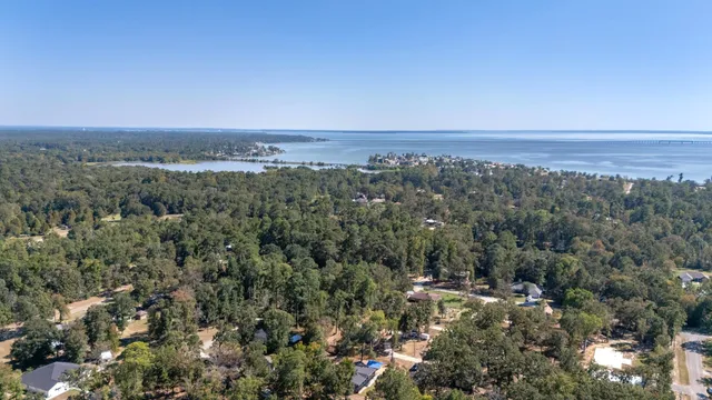 an aerial view of a city and mountain