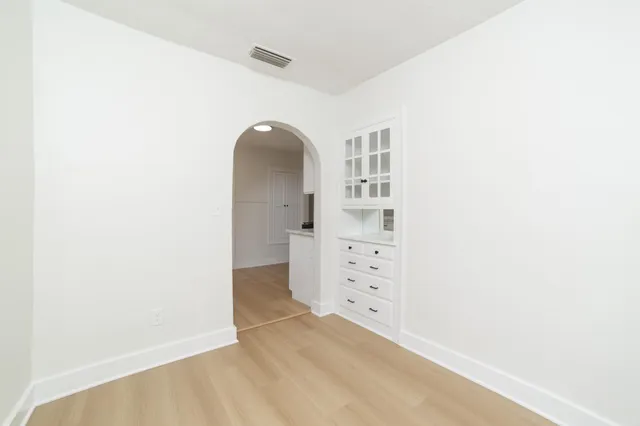 an empty room with windows