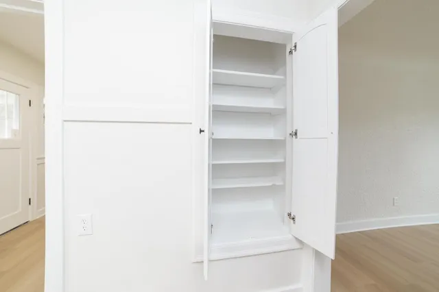 a view of a room with storage and racks