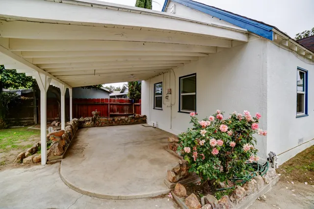 a view of a porch with seating space