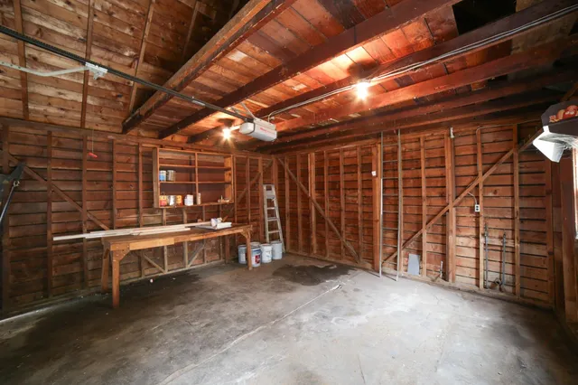 a view of an empty room with furniture