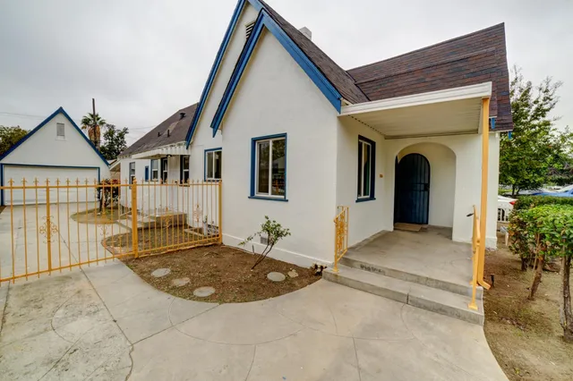 a view of a house with a wooden floor and a tub