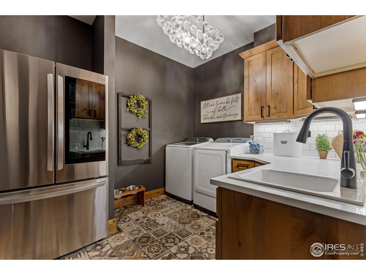 2734 Southwind Road Berthoud, CO 80513 - Photo 23 of 50 Oversized Laundry Room with Sink, Storage, and Full-sized Refrigerator