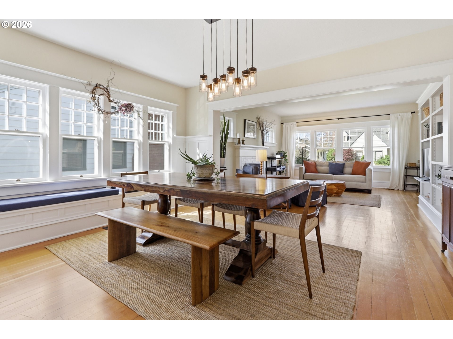 3326 Northeast 60th Avenue Portland, OR 97213 - Photo 12 of 46 a living room with furniture dining table and a chandelier