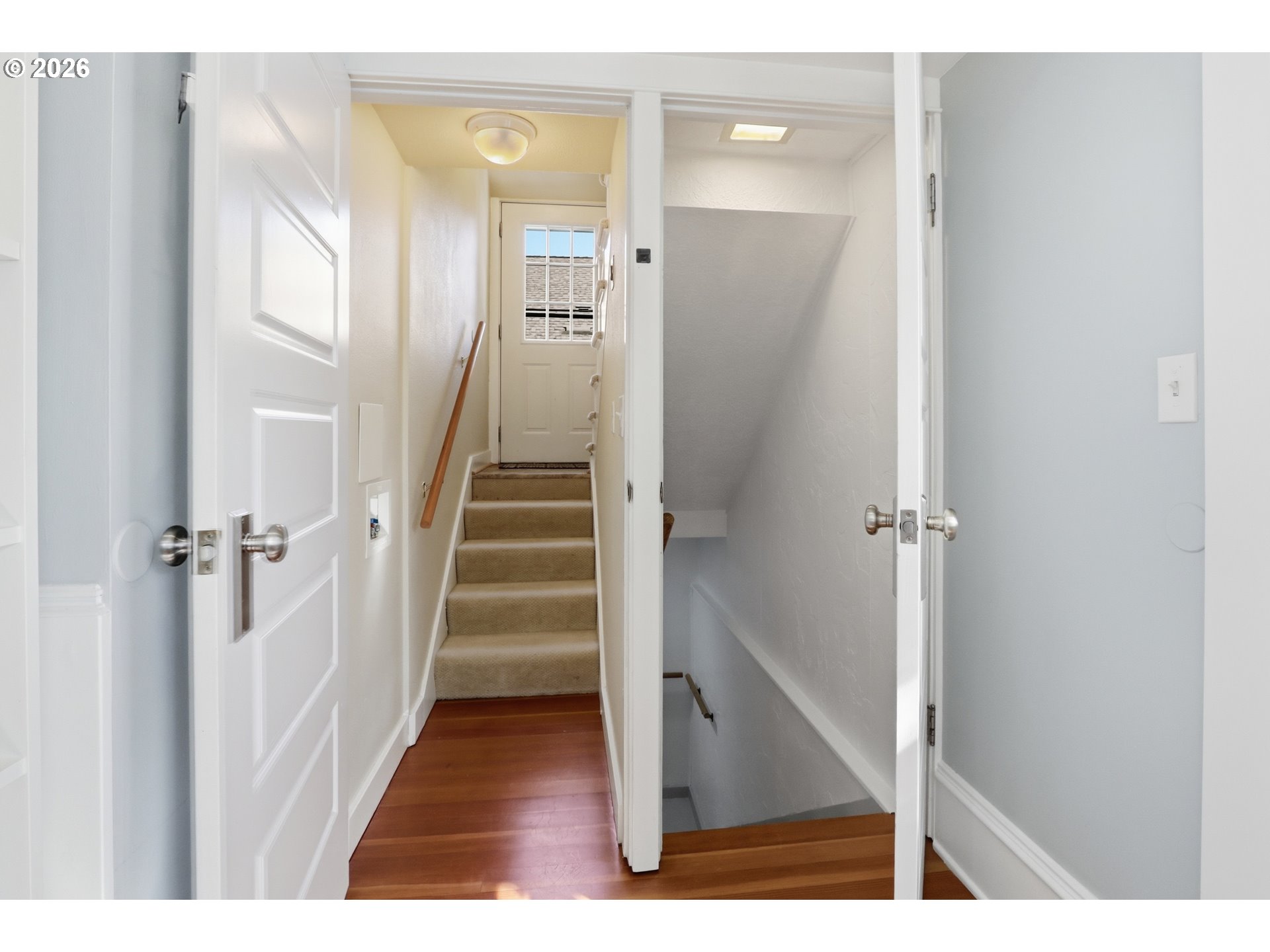 3326 Northeast 60th Avenue Portland, OR 97213 - Photo 20 of 46 a view of a hallway with wooden floor and staircase