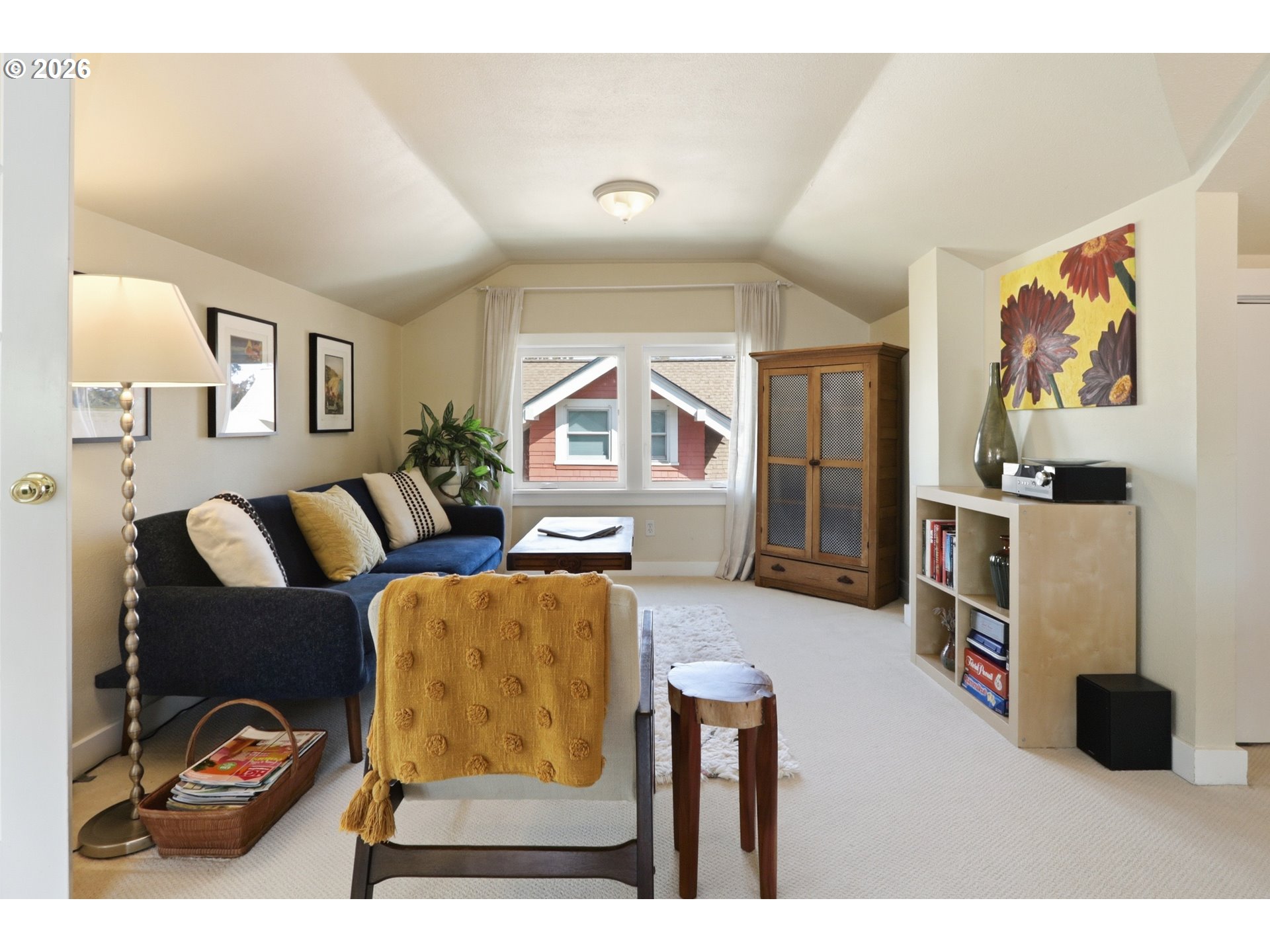 3326 Northeast 60th Avenue Portland, OR 97213 - Photo 22 of 46 a living room with furniture and a window
