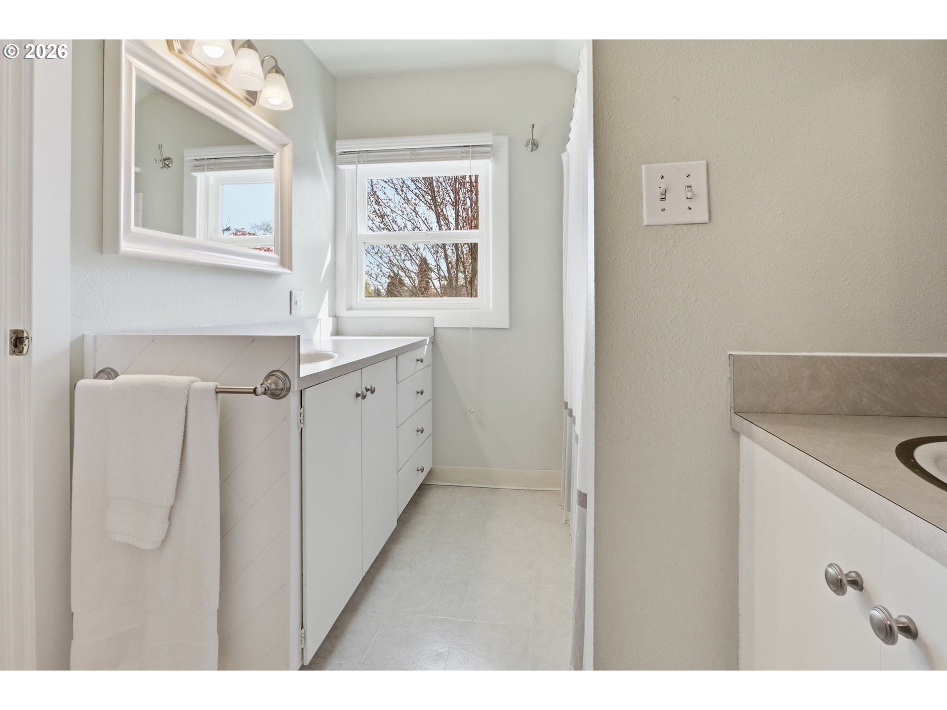 3326 Northeast 60th Avenue Portland, OR 97213 - Photo 28 of 46 a kitchen with a sink cabinets and a window