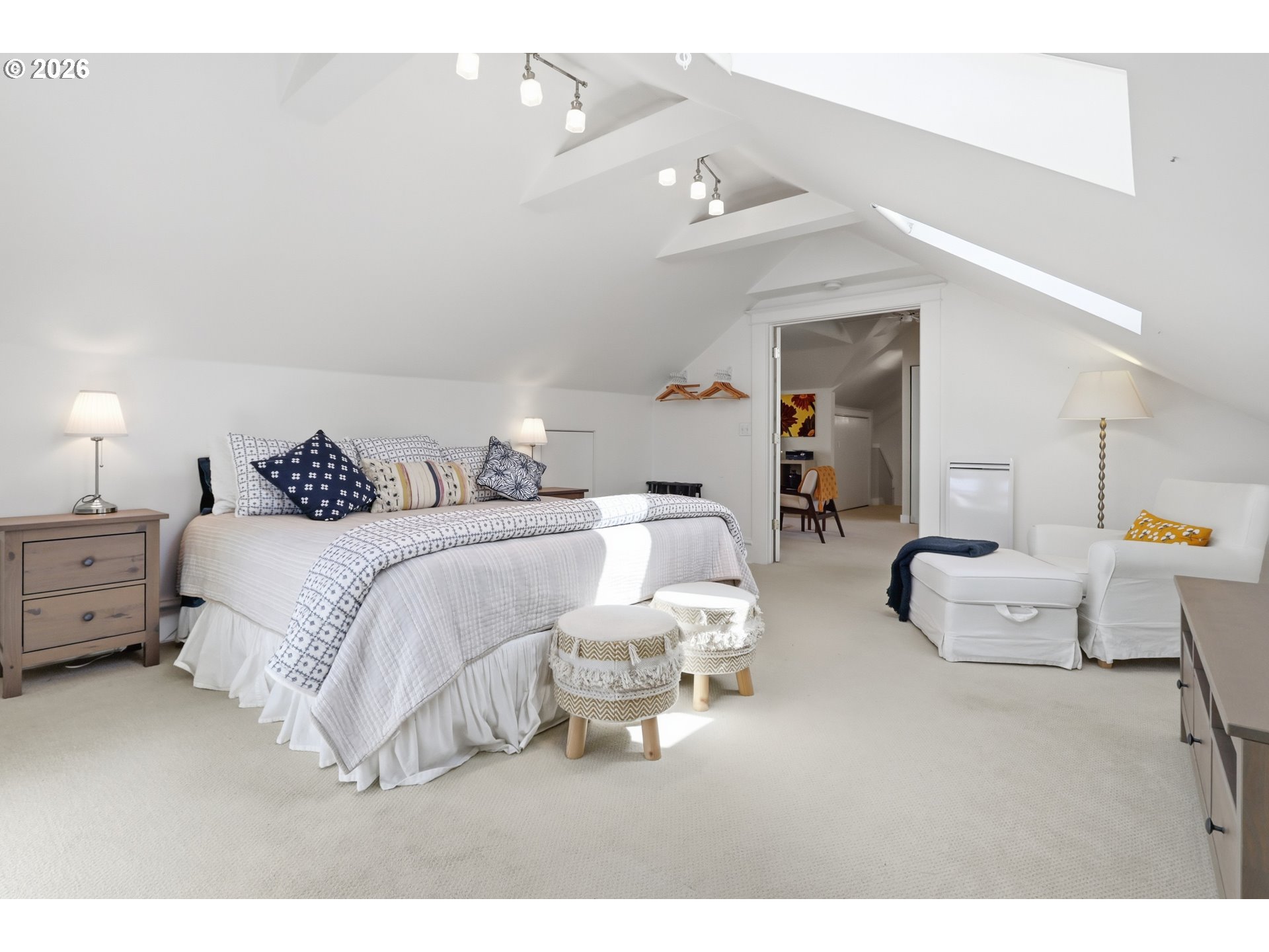 3326 Northeast 60th Avenue Portland, OR 97213 - Photo 31 of 46 a bedroom with a bed and window