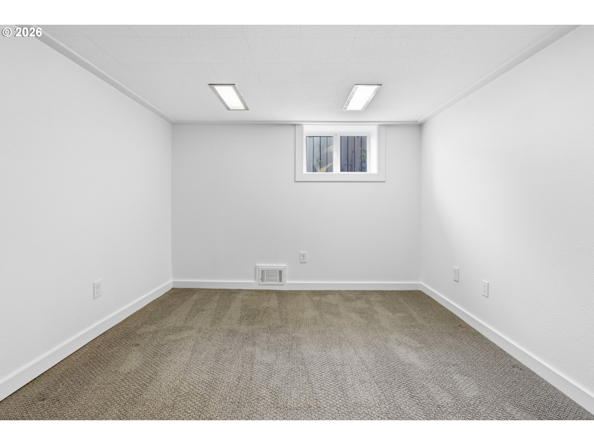 3326 Northeast 60th Avenue Portland, OR 97213 - Photo 36 of 46 a view of an empty room with a window