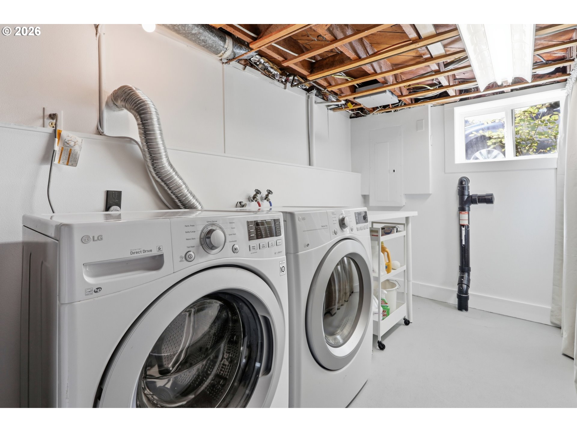 3326 Northeast 60th Avenue Portland, OR 97213 - Photo 40 of 46 a utility room with dryer and washer