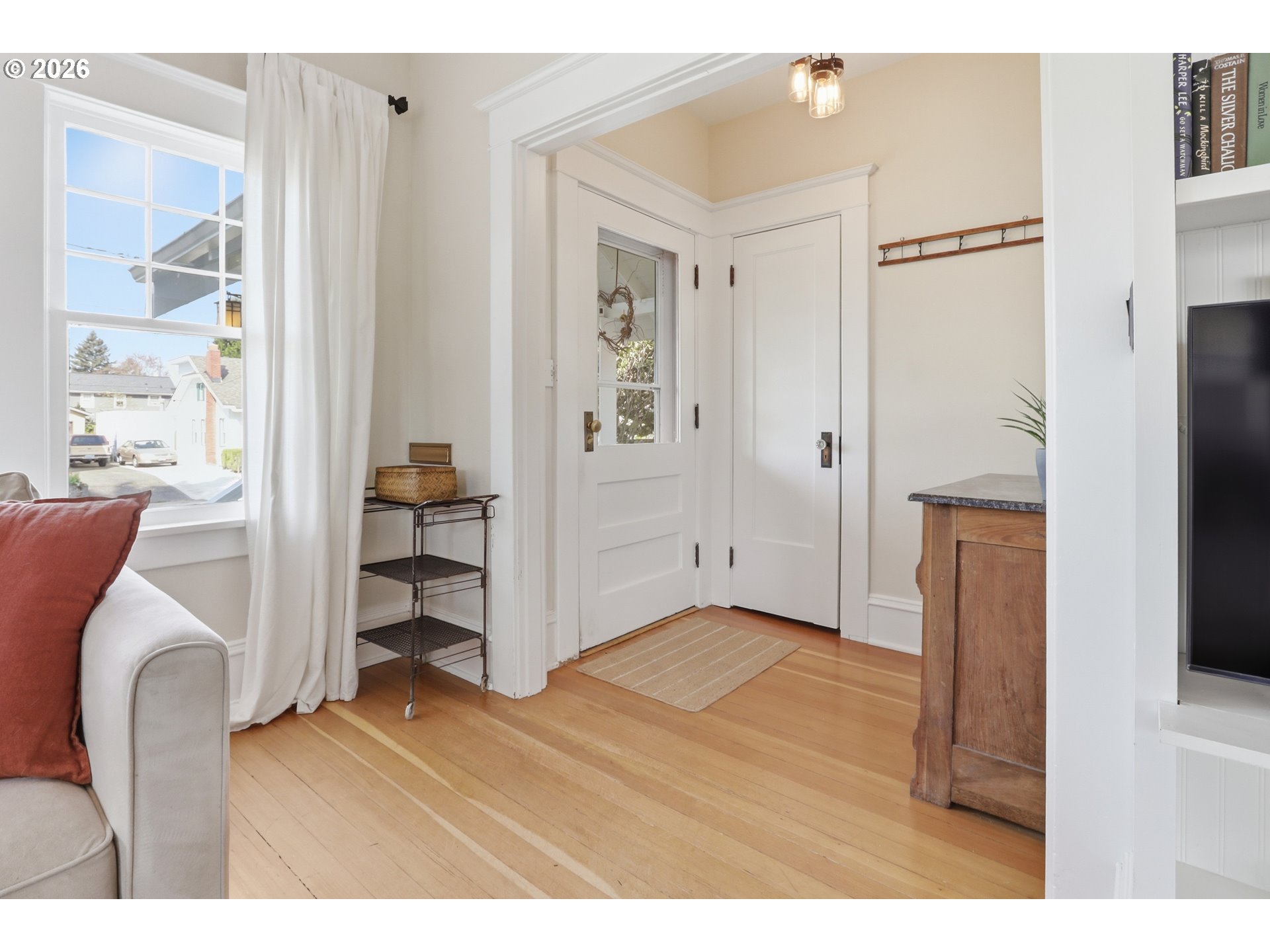3326 Northeast 60th Avenue Portland, OR 97213 - Photo 6 of 46 a view of livingroom with hardwood floor and a window