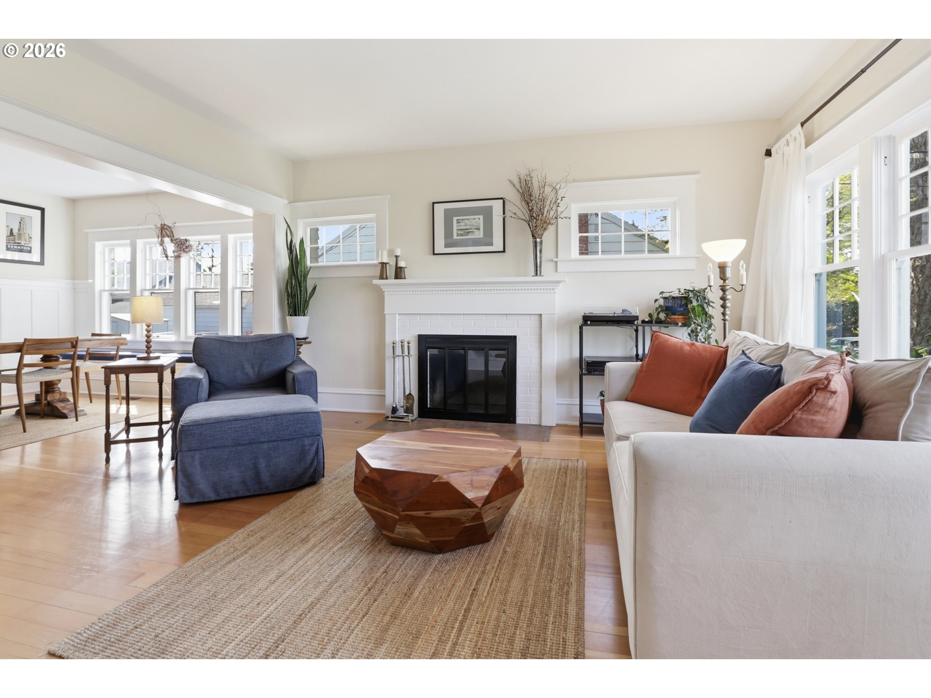 3326 Northeast 60th Avenue Portland, OR 97213 - Photo 7 of 46 a living room with furniture and a fireplace