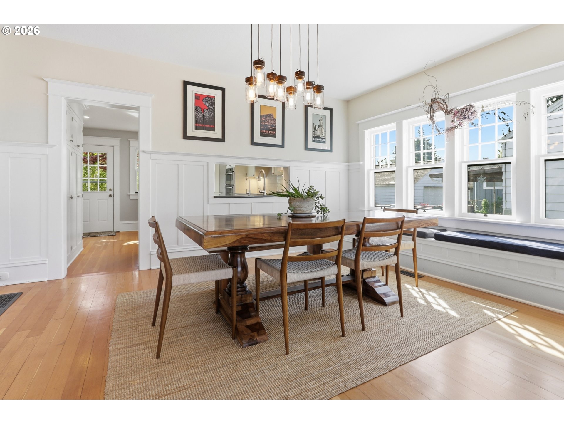 3326 Northeast 60th Avenue Portland, OR 97213 - Photo 10 of 46 a view of a dining room with furniture a chandelier and wooden floor