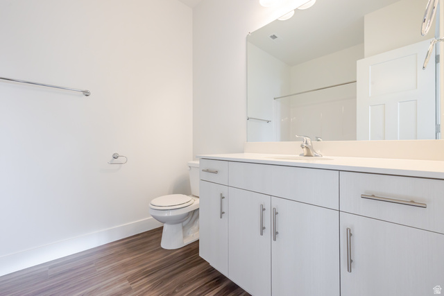 4662 Poplar Way, Unit Q302 Mapleton, UT 84664 - Photo 7 of 17 Full bath featuring vanity and dark wood-type flooring