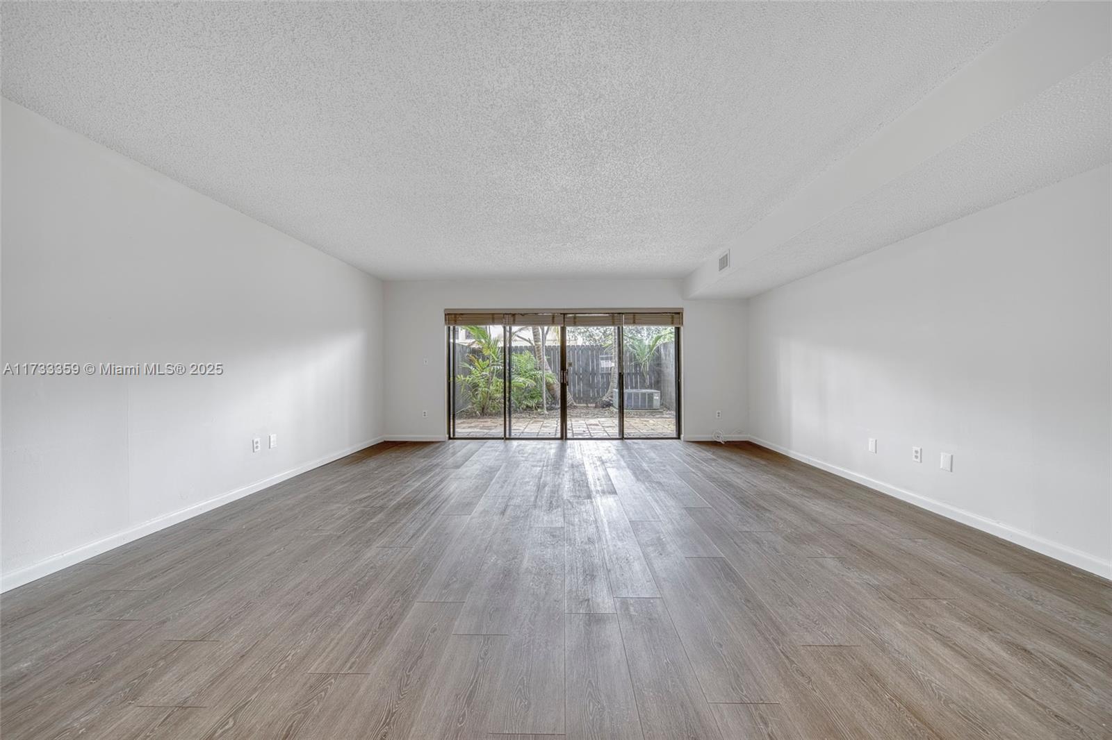 7890 Southwest 86th Street, Unit 9 Miami, FL 33156 - Photo 13 of 39 Large expansive living area