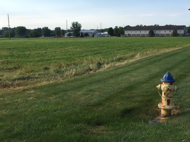 801 East Etna Road Ottawa, IL 61350 - Photo 10 of 12 a view of a golf course with a garden