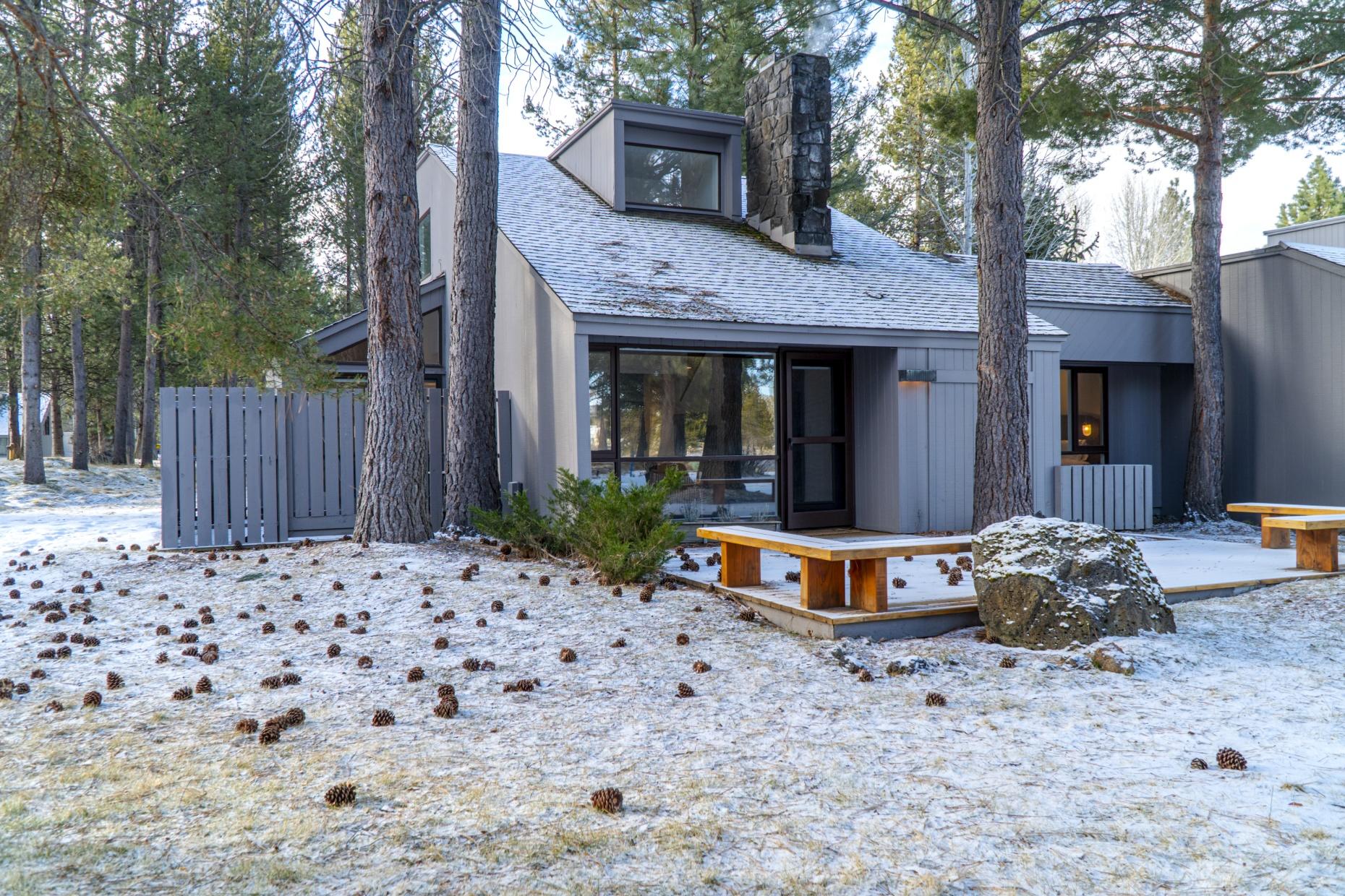 57257 Island Road Sunriver, OR 97707 - Photo 2 of 27 a backyard of a house with seating space