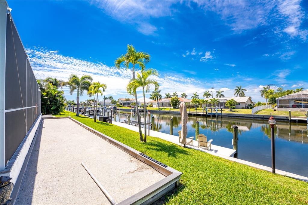 391 Vía Esplanade Punta Gorda, FL 33950 - Photo 34 of 60 a view of a lake with couches