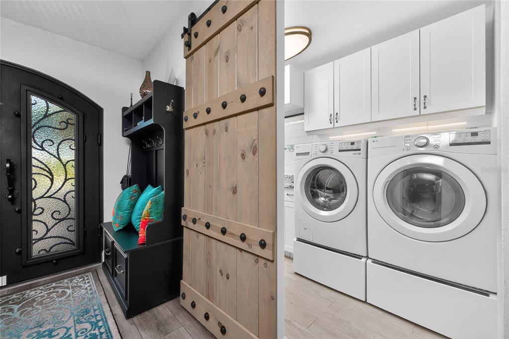 391 Vía Esplanade Punta Gorda, FL 33950 - Photo 46 of 60 a view of entryway with washer and dryer