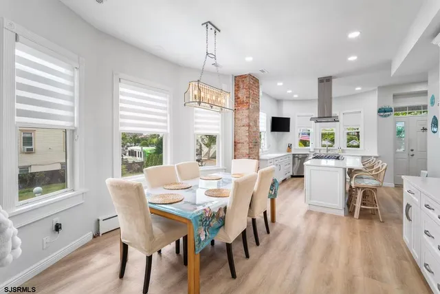 a bath room with a toilet and a sink